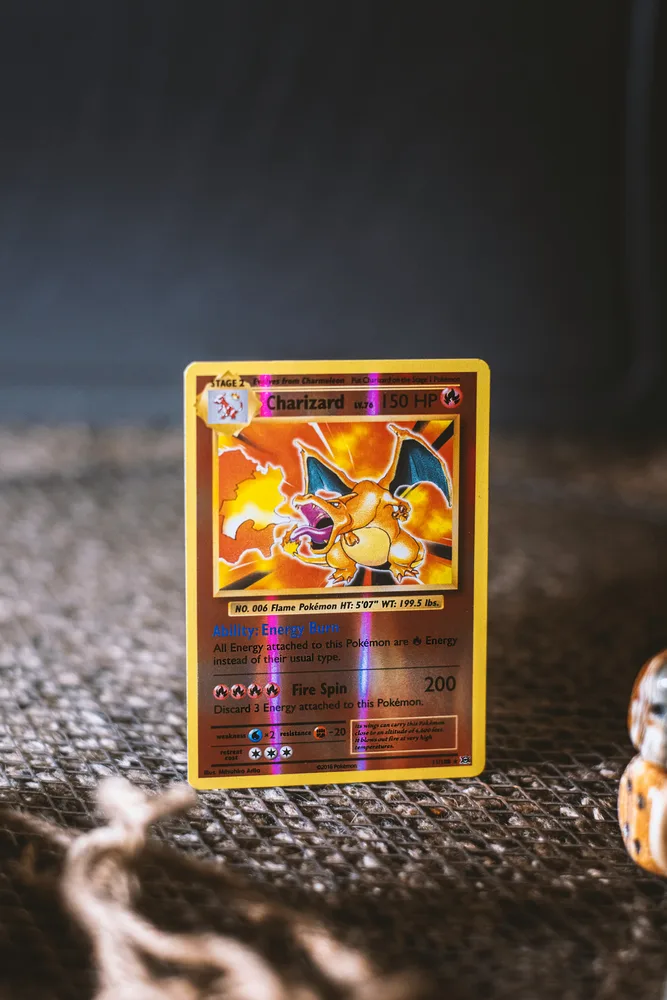 Holographic Charizard Pokémon card in your collection